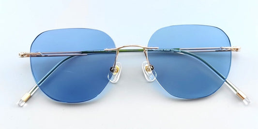 The Allure of Blue: Titanium Rimless Glasses with Photochromic Lenses - HP eyeglasses