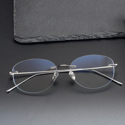 Minimalist Oval Rimless Glasses | Ultra-Light Pure Titanium Silver Optical Frame for Men & Women 52024