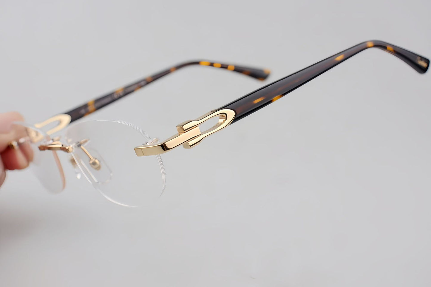 Cartier-Style Pure Titanium Oval Rimless Glasses Designer Vintage Optical Frame for Men & Women – CT0455OJ