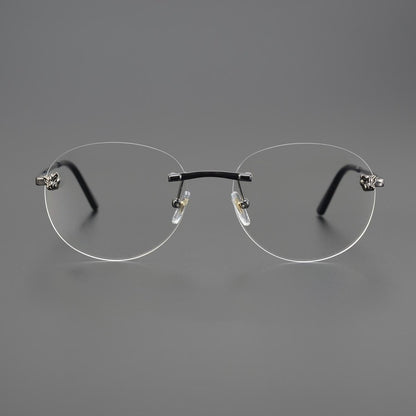 Business Rimless Round Titanium Alloy Glasses with Panther Head Detail – CT0028O - HP eyeglasses