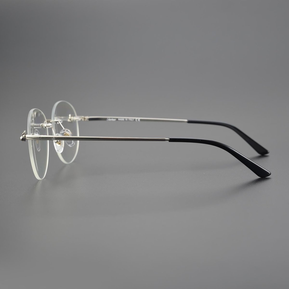 Business Rimless Round Titanium Alloy Glasses with Panther Head Detail – CT0028O - HP eyeglasses