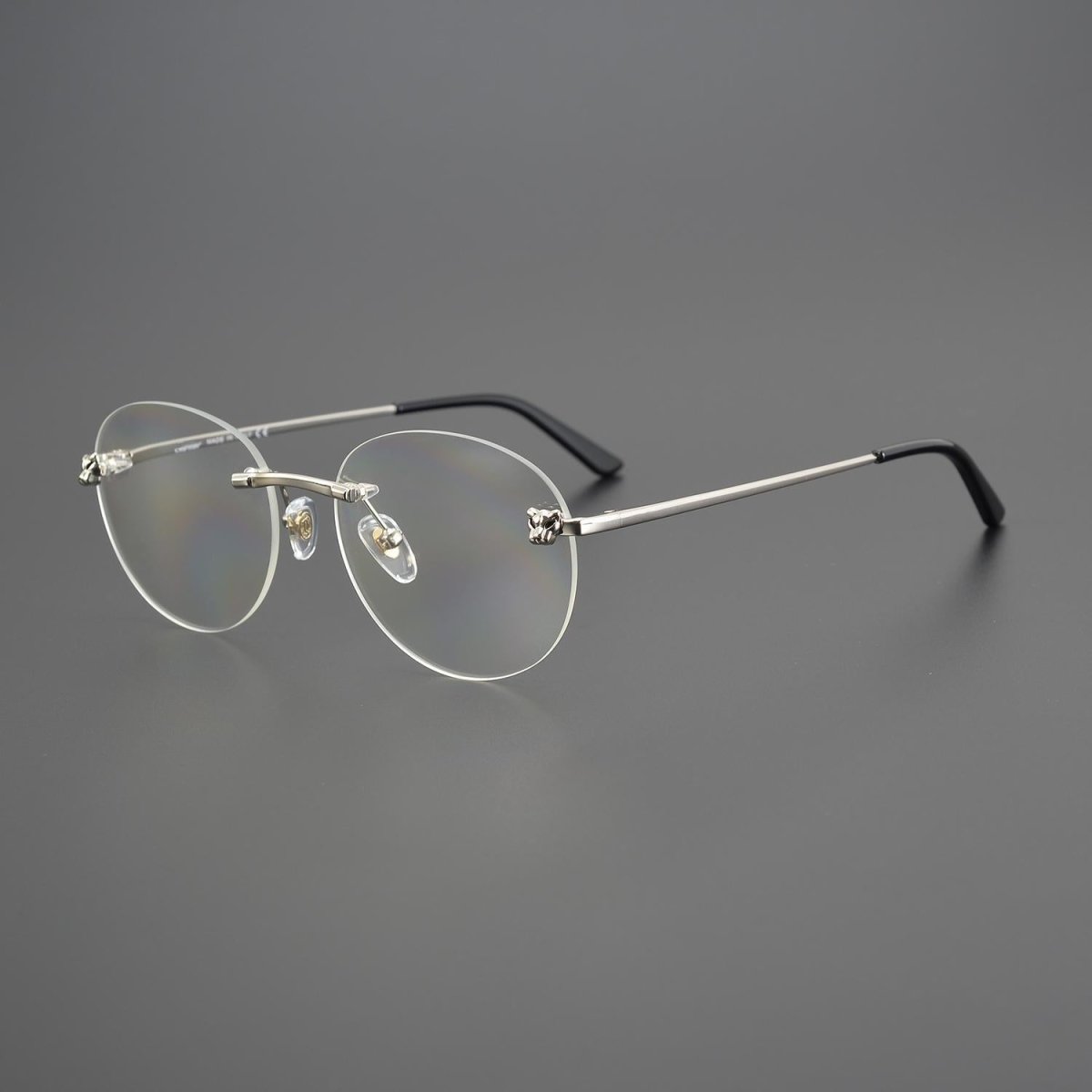 Business Rimless Round Titanium Alloy Glasses with Panther Head Detail – CT0028O - HP eyeglasses