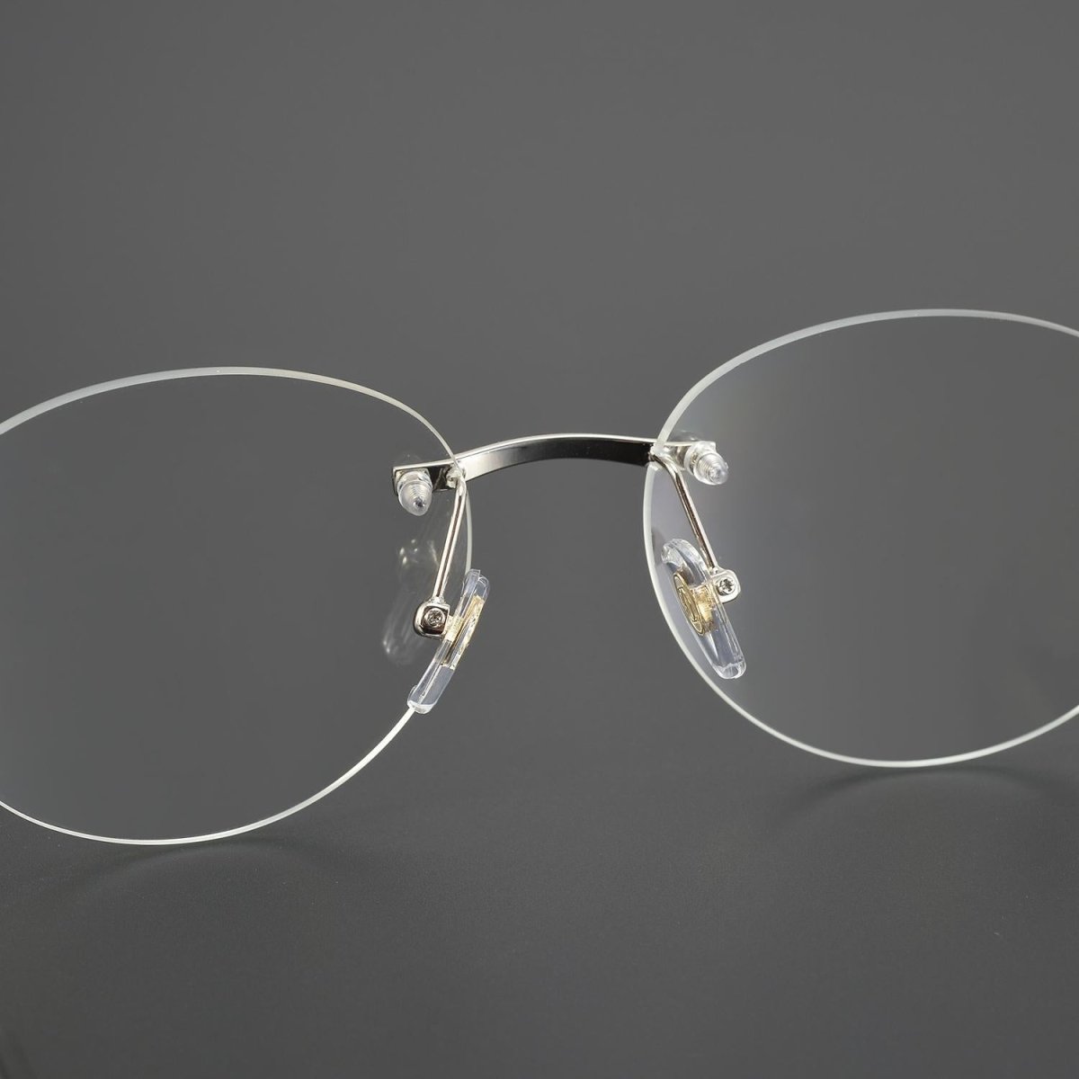 Business Rimless Round Titanium Alloy Glasses with Panther Head Detail – CT0028O - HP eyeglasses