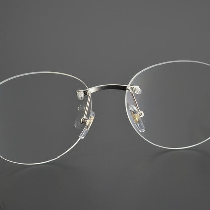 Business Rimless Round Titanium Alloy Glasses with Panther Head Detail – CT0028O - HP eyeglasses