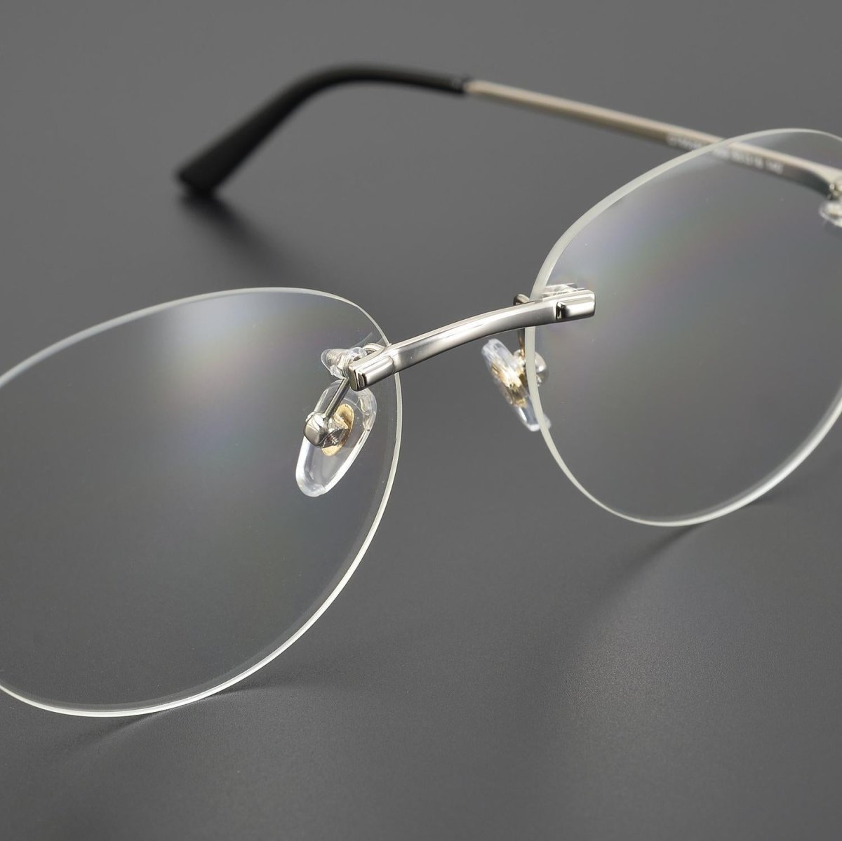 Business Rimless Round Titanium Alloy Glasses with Panther Head Detail – CT0028O - HP eyeglasses