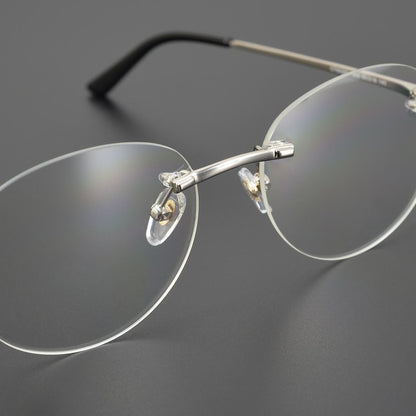Business Rimless Round Titanium Alloy Glasses with Panther Head Detail – CT0028O - HP eyeglasses
