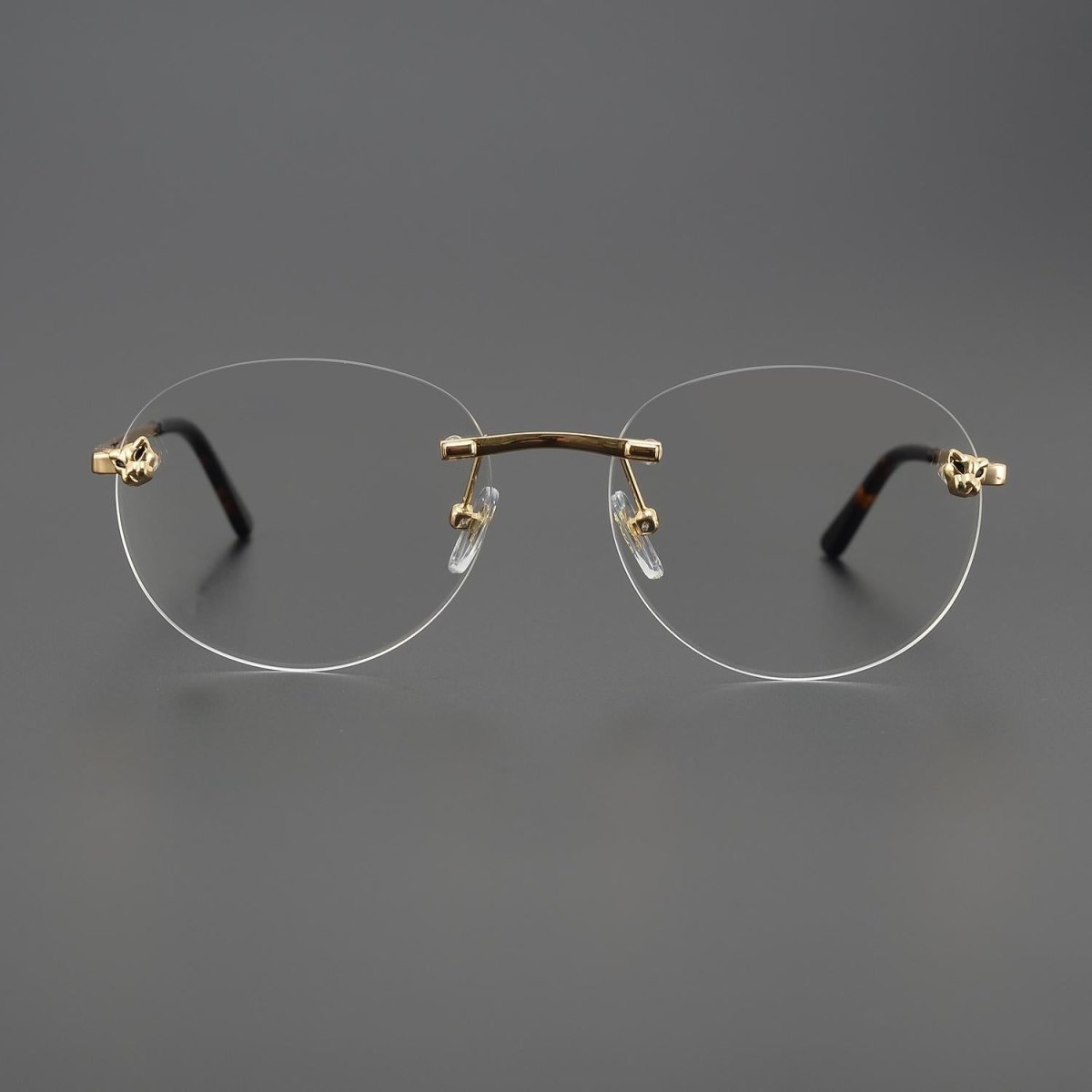Business Rimless Round Titanium Alloy Glasses with Panther Head Detail – CT0028O - HP eyeglasses