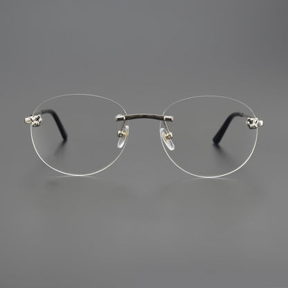 Business Rimless Round Titanium Alloy Glasses with Panther Head Detail – CT0028O - HP eyeglasses