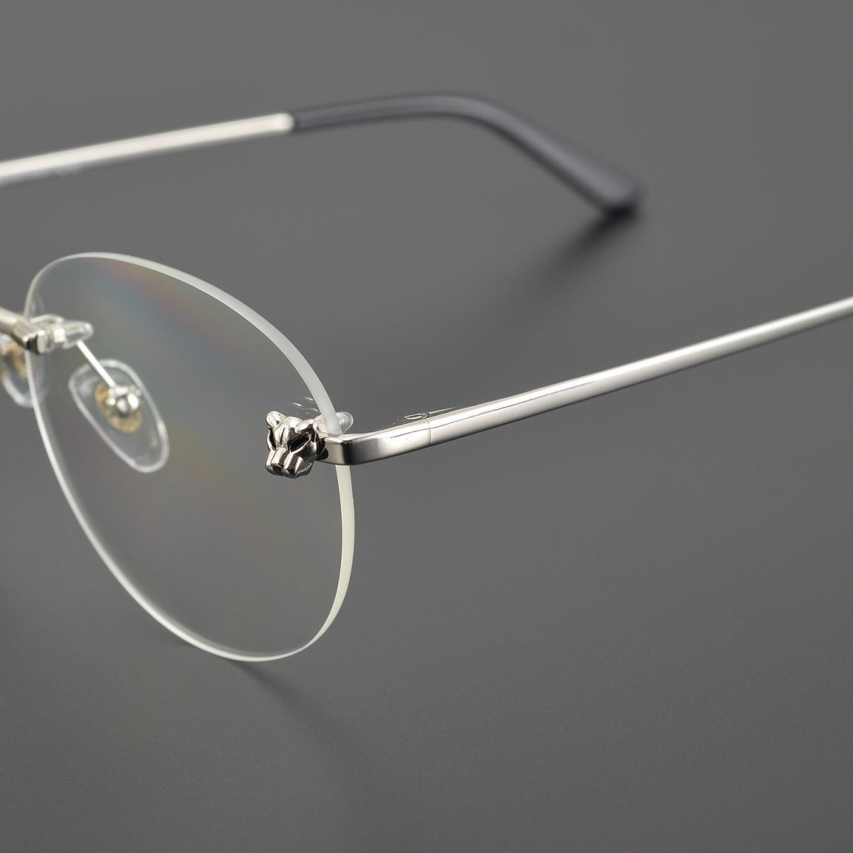 Business Rimless Round Titanium Alloy Glasses with Panther Head Detail – CT0028O - HP eyeglasses