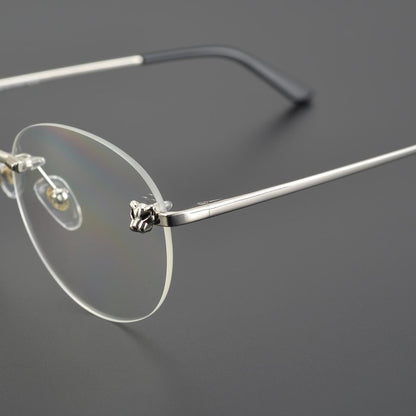 Business Rimless Round Titanium Alloy Glasses with Panther Head Detail – CT0028O - HP eyeglasses