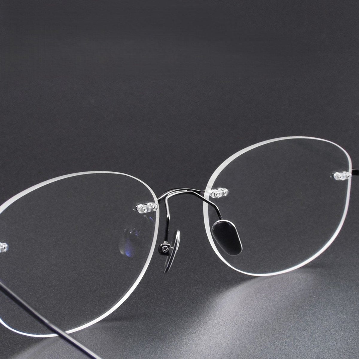 Minimalist Oval Rimless Glasses | Ultra-Light Pure Titanium Silver Optical Frame for Men & Women 52024 - HP eyeglasses
