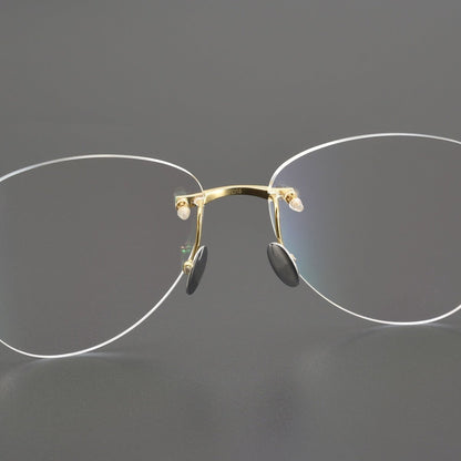 Retro Rimless Round Titanium Eyeglasses in Silver & Gold | Lightweight Aviator - Style Frame – CT0254O - HP eyeglasses